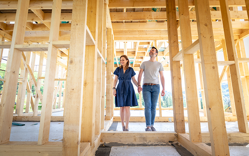 image of a couple walking through a new build