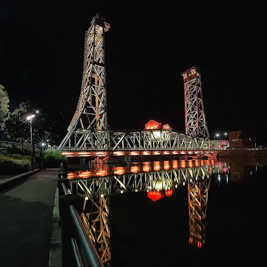 image of bridge 13 at night glowing orange