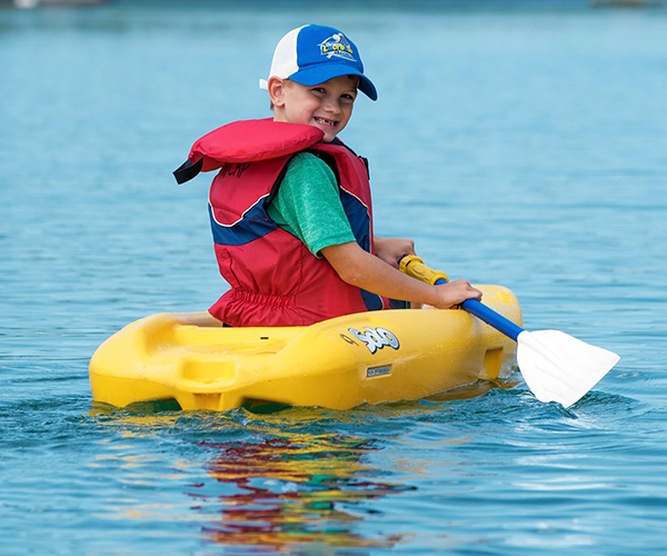 image of a child in a kayak