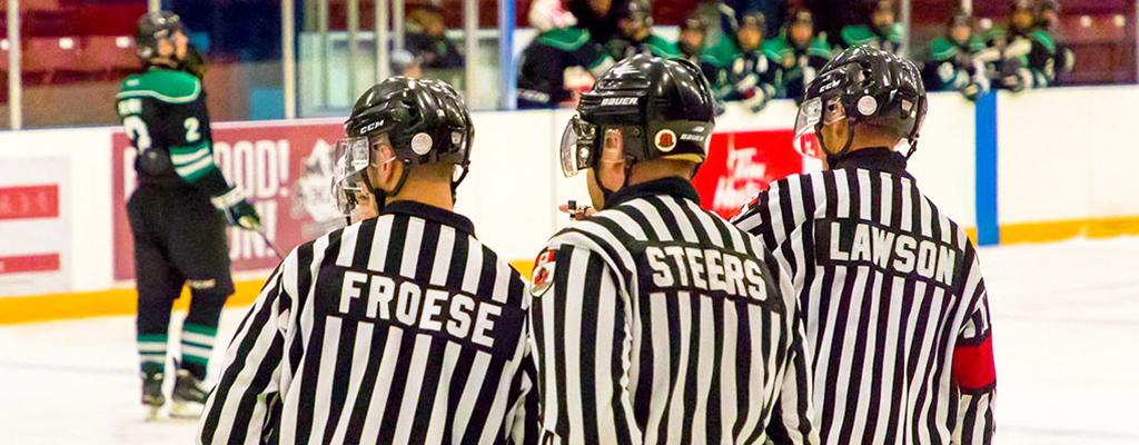 image of hockey referees