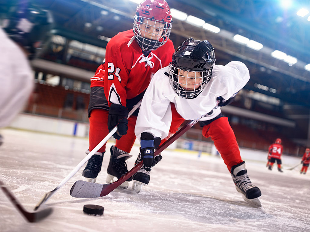 image of youth playing hockey