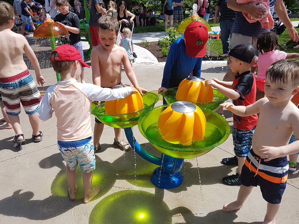kids pplaying at Chippawa Park splash pad