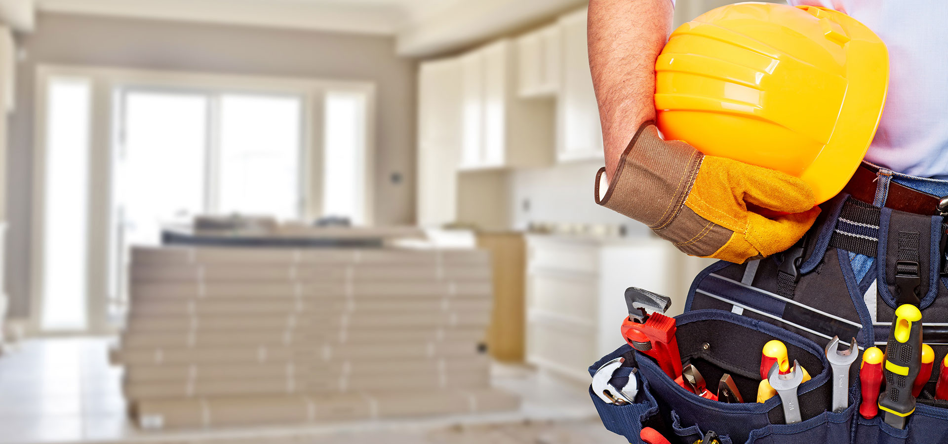 image of construction worker in new home