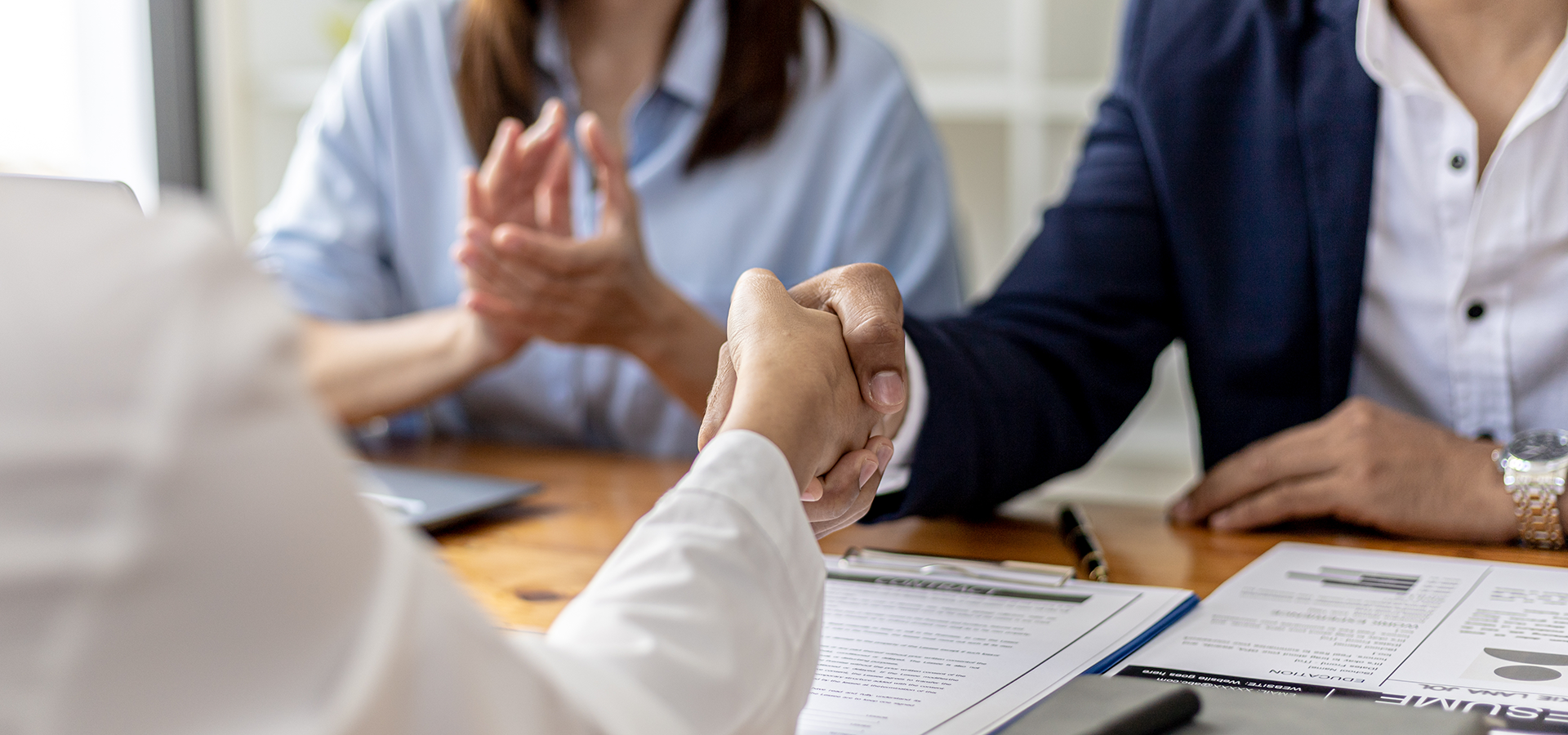 shaking hands after a successful job interview.