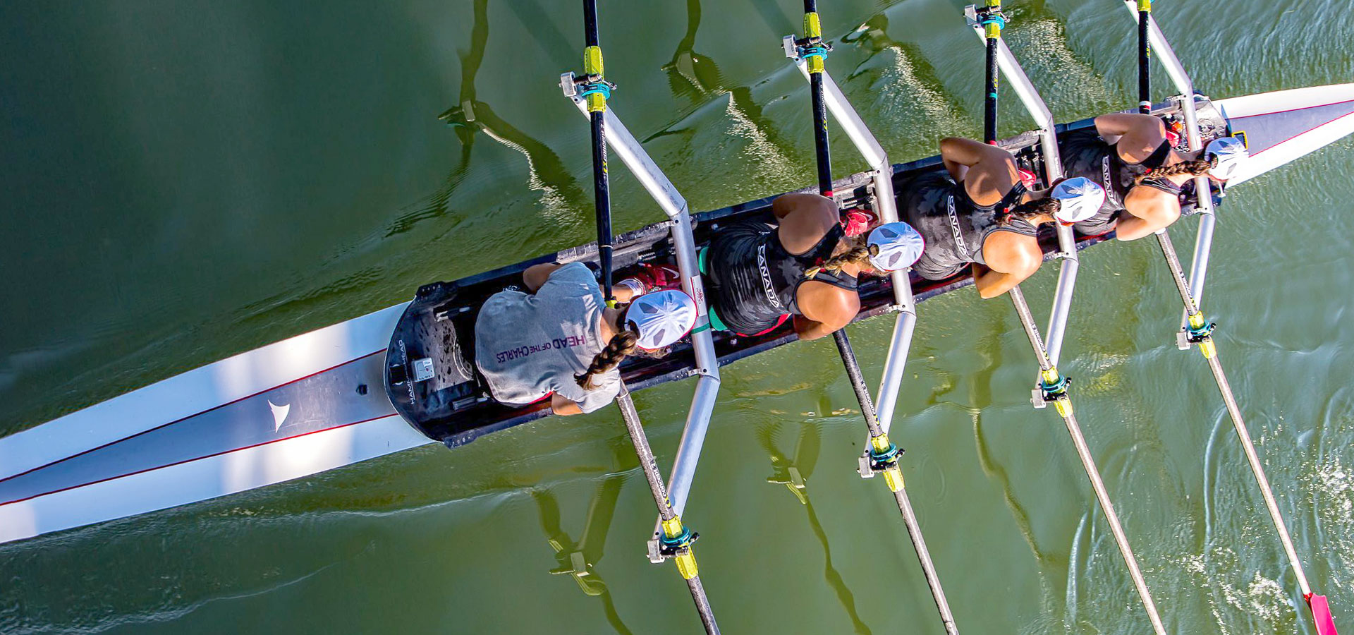 four girls rowing